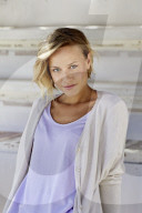 Portrait of a young Woman wearing a Cardigan