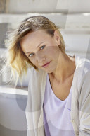 Portrait of a young Woman wearing a Cardigan