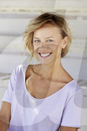 Portrait of a young sporty Woman wearing a T-Shirt