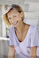Portrait of a young sporty Woman wearing a T-Shirt