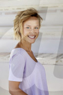 Portrait of a young sporty Woman wearing a T-Shirt