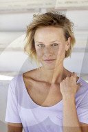 Portrait of a young sporty Woman wearing a T-Shirt