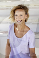 Portrait of a young sporty Woman wearing a T-Shirt