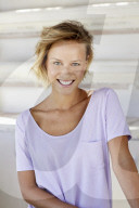 Portrait of a young sporty Woman wearing a T-Shirt