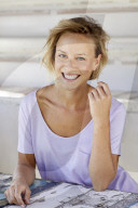 Portrait of a young sporty Woman wearing a T-Shirt