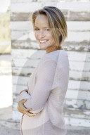 Portrait of a young Woman wearing a Cardigan
