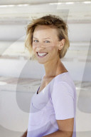 Portrait of a young sporty Woman wearing a T-Shirt