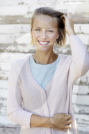 Portrait of a young Woman wearing a Cardigan