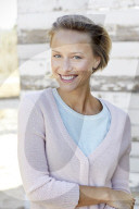 Portrait of a young Woman wearing a Cardigan