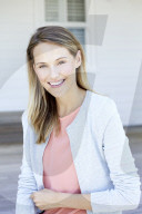 Young woman in babyblue cardigan