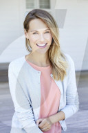 Young woman in babyblue cardigan