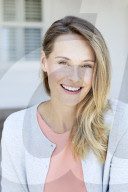 Young woman in babyblue cardigan