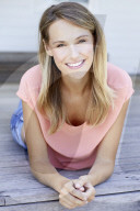 Blond woman relaxing on the deck