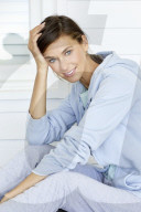 Sporty woman in blue hoodie