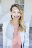 Young woman in babyblue cardigan