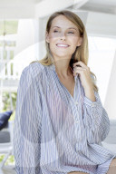 Woman in semi transparent blouse