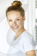Young woman in mint coloured t-shirt