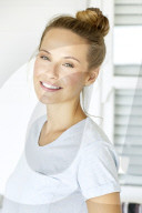 Young woman in mint coloured t-shirt