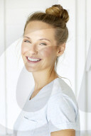 Young woman in mint coloured t-shirt