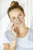 Young woman in mint coloured t-shirt