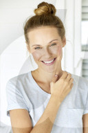 Young woman in mint coloured t-shirt