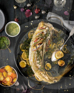 Fisch vom Blech mit Kartoffeln und Sossen, Fish from the plate with potatoes and sauces