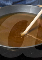Step 5, Churros, Checking Temperature with wooden Spoon