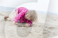 Blonde Girl having fun at the Beach