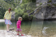 Mother and Daughter enjoying Leisure Time together at a River