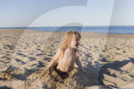 Blonde Girl having Fun at the Beach