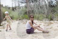 Mother and Daughter together on Vacation taking a Rest