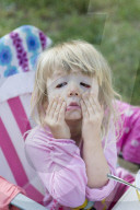 Blonde Girl grimaces