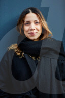  Woman wearing a black Coat and a Scarf
