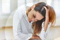Sad Woman wearing a white Shirt 