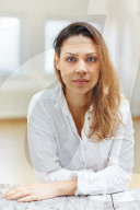 Sad Woman wearing a white Shirt 
