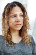 Portrait of a Woman with curly Hair 