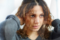Portrait of a Woman with curly Hair 