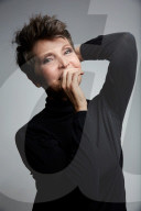 Mature Woman wearing a black Turtleneck
