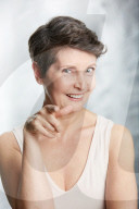 Mature Woman pointing at Someone