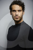  Portrait of a Young Man wearing a grey Pullover
