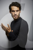  Portrait of a Young Man wearing a grey Pullover