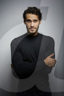  Portrait of a Young Man wearing a grey Pullover