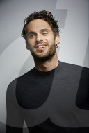  Portrait of a Young Man wearing a grey Pullover