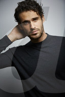  Portrait of a Young Man wearing a grey Pullover