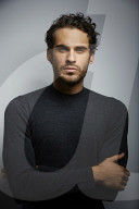  Portrait of a Young Man wearing a grey Pullover