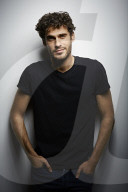  Young Man wearing a dark T-Shirt
