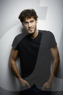  Young Man wearing a dark T-Shirt