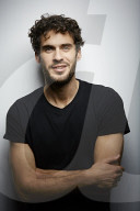  Young Man wearing a dark T-Shirt