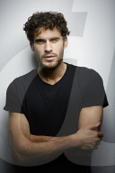  Young Man wearing a dark T-Shirt