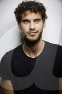  Young Man wearing a dark T-Shirt